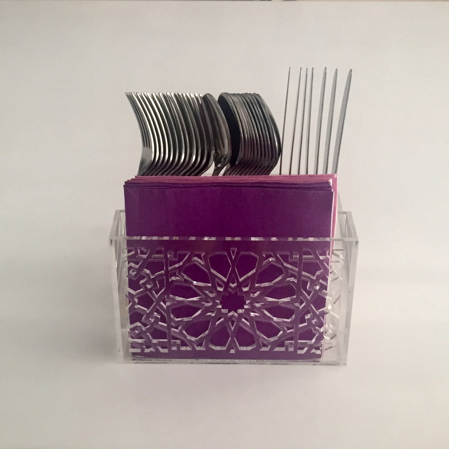 Cutlery holder with engraved design
